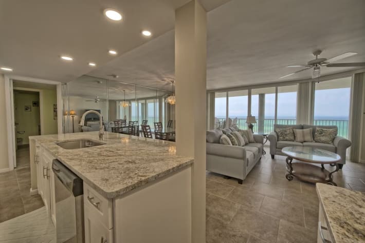 Recessed lighting in main living area with smooth elegant ceilings