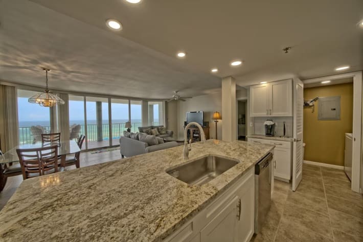 Modern remodeled kitchen with oversized island beautiful granite with views