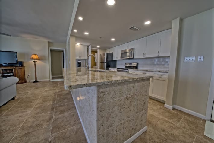 Island with saddle bar stools