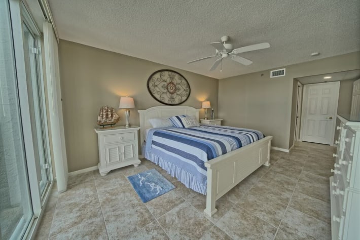 One of two large masters with new paint, flooring, linens, and more.