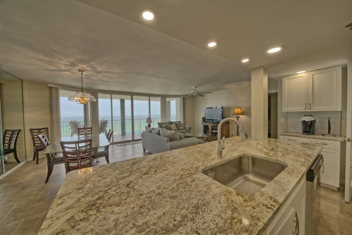 Large island sink with garbage disposal. Coffee bar with Keurig and Cuisinart