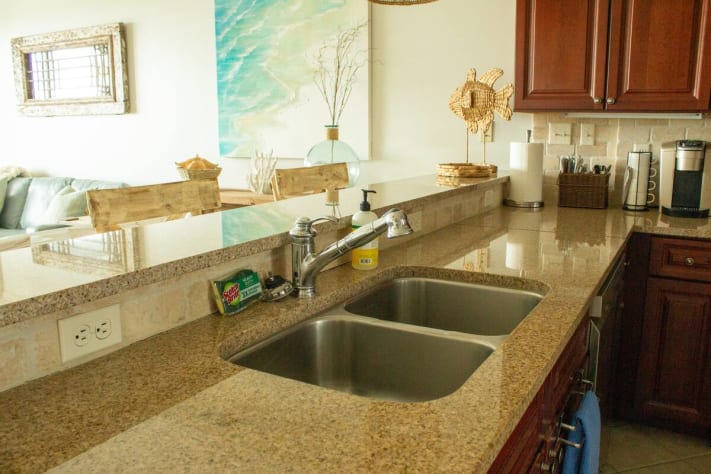Open kitchen space with kitchen island seating space