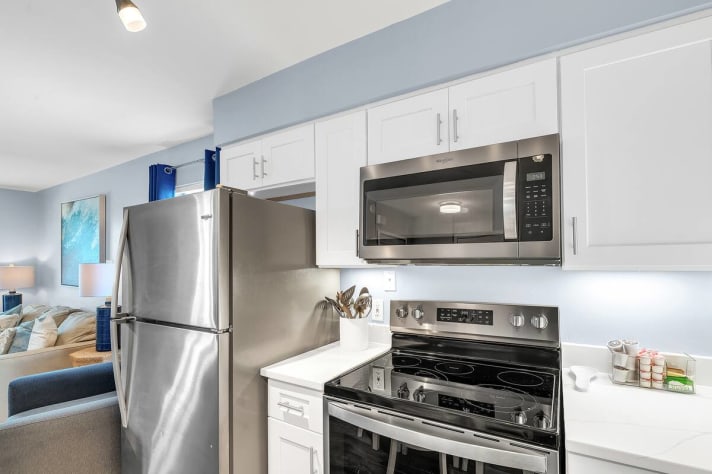 Fully stocked kitchen, including stainless steel appliances