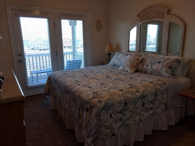 Second floor (King) bedroom; Gulf view from French doors onto balcony