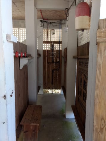 Shower with hot/cold water; roomy changing area