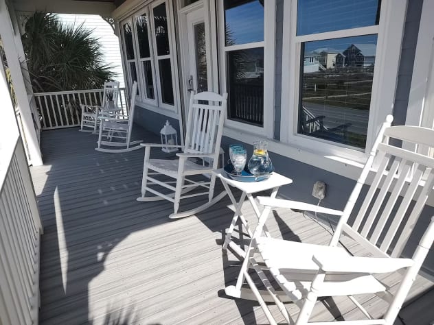 Front porch perfect for watching the waves, rocking and sipping sweet tea