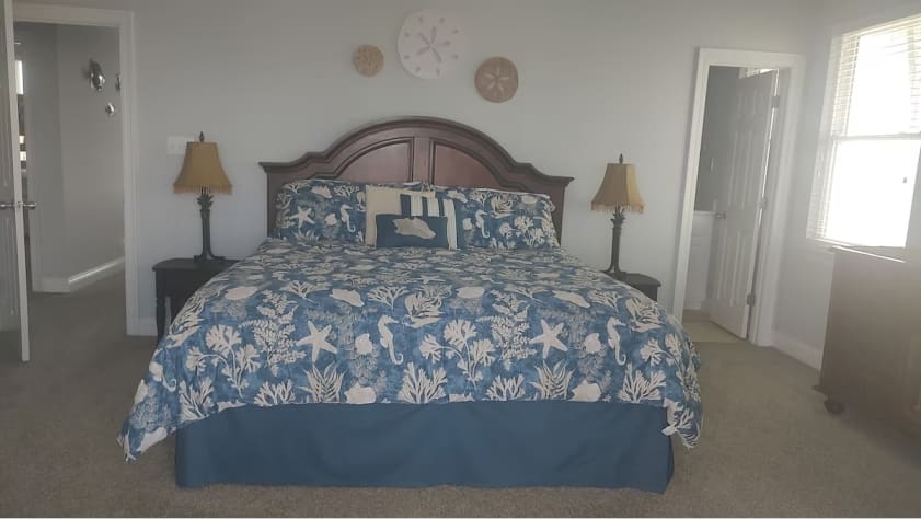 Primary Bedroom with en suite and view of the Gulf