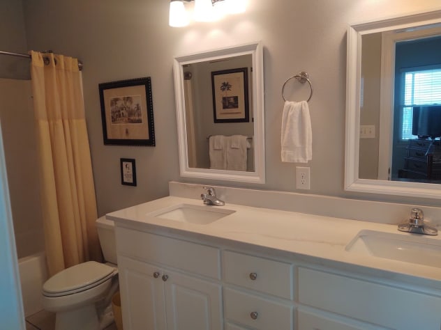 Primary Bath with tub/shower, magnifying mirror