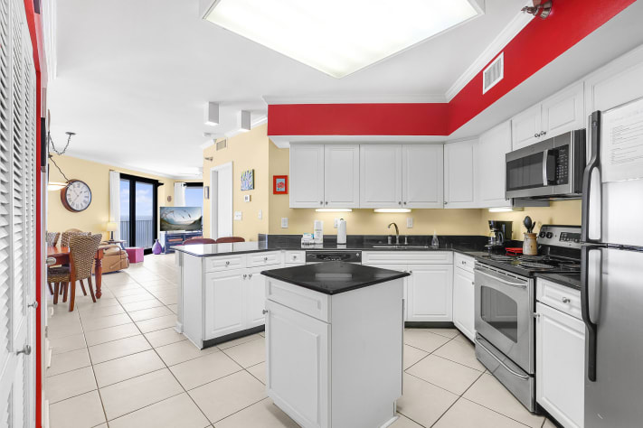 Open kitchen space with kitchen island seating space