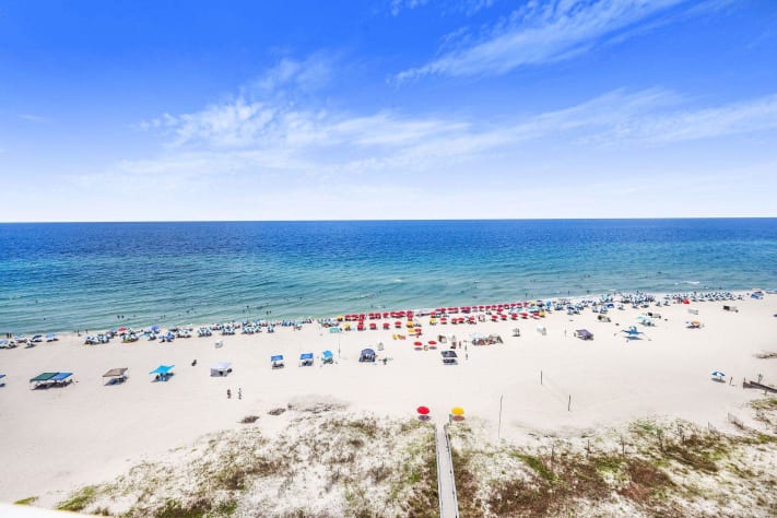 Sandy beach with bright blue skyline