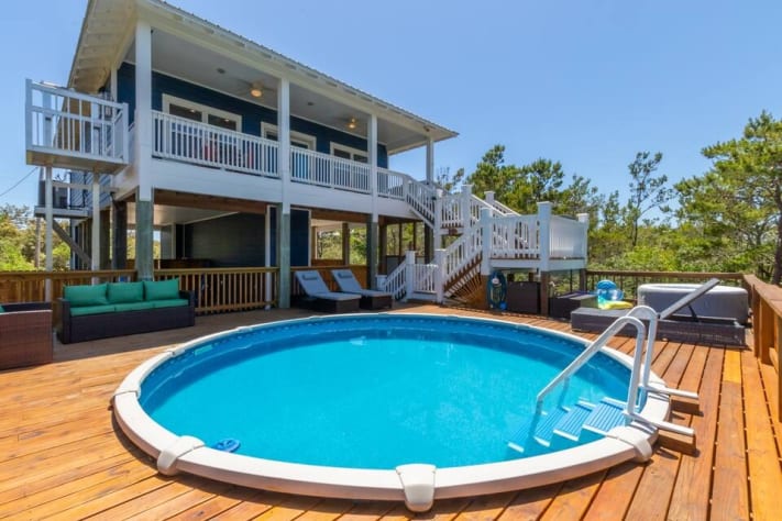 Fort Morgan, AL private pool in secluded property surrounded by legally protected nature (see all photos). Hot tub and telescope for star gazing - 95% free of light pollution at night. Deck w/ 3 loungers and seating for 6+.Take a break from the beach