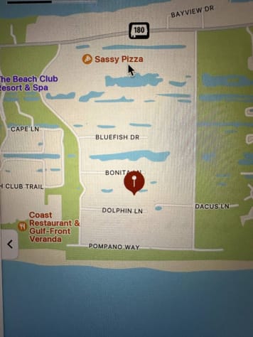 Private neighborhood, no trespassing, 2nd road from neighborhood beach. Federally protected sand dunes cannot be walked on, so a short walk around them to the beach. Fort Morgan, AL Property surrounded on 2.5 sides by 5 acres of nature.