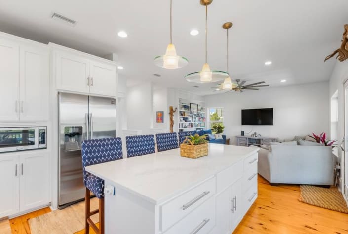 Completely remodeled in 2024 with fully stocked kitchen including separate icemaker under the kitchen island, gas stove, oven, farmhouse sink, dishwasher, refrigerator and microwave - lots of pots, pans, chacuterie board, Bose blue tooth.