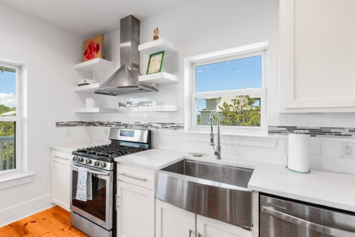 Completely updated in 2024 with fully stocked kitchen including separate icemaker under the kitchen island, gas stove, oven, farmhouse sink, dishwasher, refrigerator and microwave - lots of pots, pans, chacuterie board, Bose blue tooth.