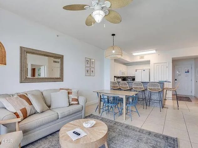 Spacious living, dining, and bar area&mdash;bright coastal design perfect for gatherings