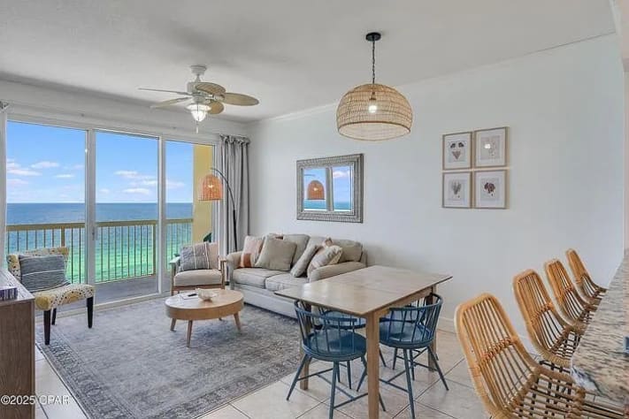 Bright coastal living room with turquoise Gulf views&mdash;relax and soak in paradise