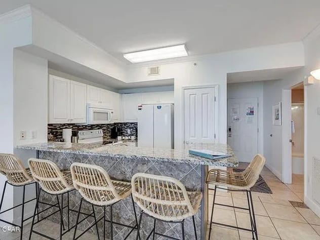Modern kitchen with marble bar seating-bright stylish and perfect for gatherings