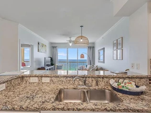 Granite kitchen counter tops with stunning Gulf view and breezy coastal charm