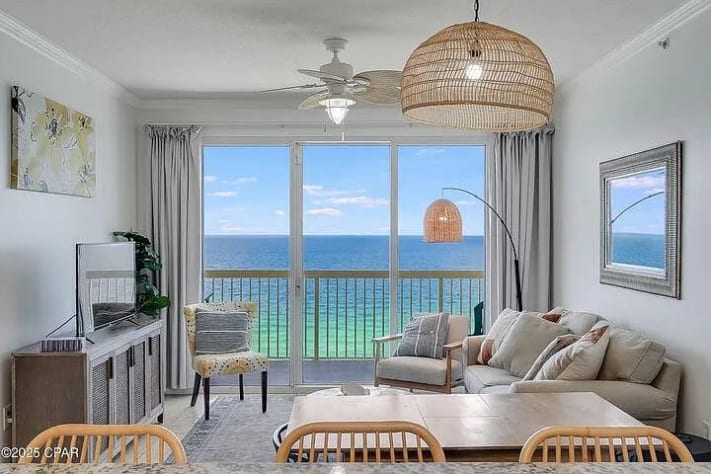 Spacious living room with stunning turquoise Gulf views-relax in coastal comfort