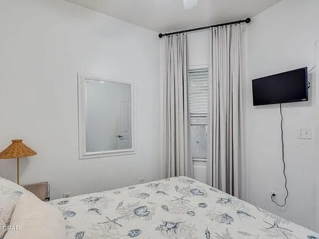 Cozy guest bedroom with hotelâ€‘quality mattress&mdash;rest easy in coastal comfort