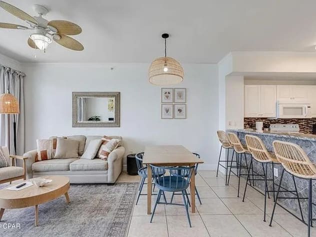 Dining area with coastal charm&mdash;gather, relax, and enjoy bright openâ€‘concept living