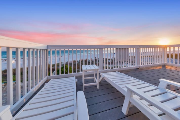 Unwind with sunset views from the rooftop lounge chairs.