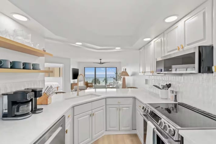 Fully equipped kitchen with modern appliances, perfect for home cooking.