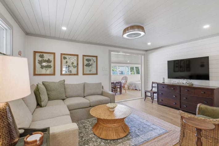 Comfy Couch with furniture and TV