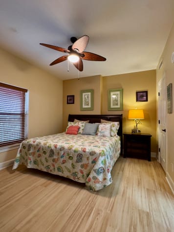 Nicely decorated guest bedroom with King bed