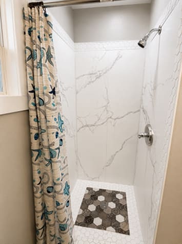 Shower in full bathroom