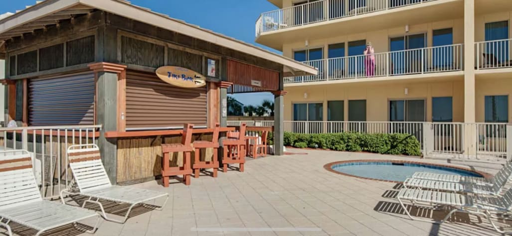 Tiki Hut providing food and beverages -small wading pool for the kids and gated.