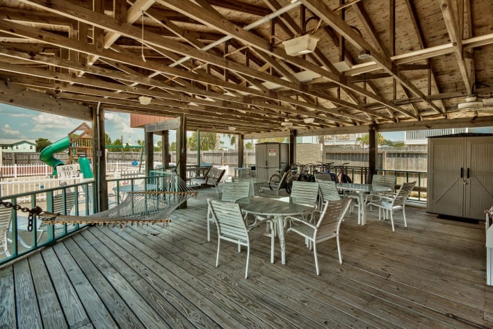 Outdoor patio hang out area. Play ground for kids, Putt Putt Course and basketball court.