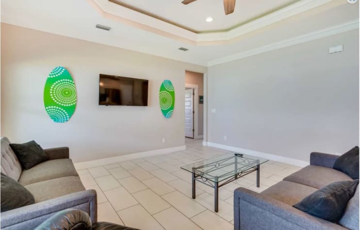 The great room is the perfect gathering place for movies and has 2 futons