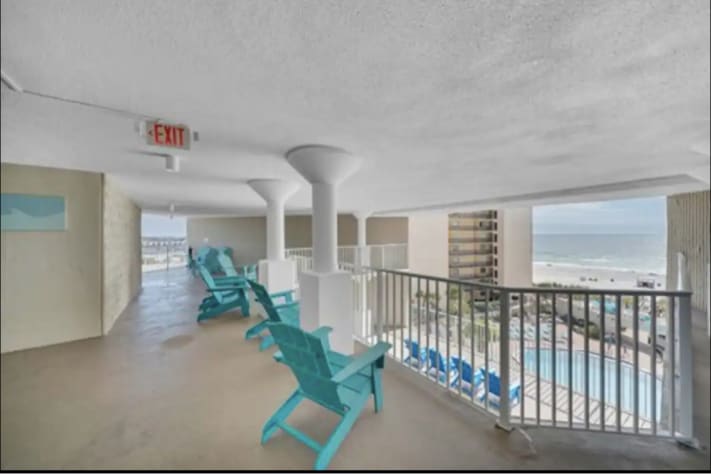 Chairs on Balcony, overlooking pool and Gulf,