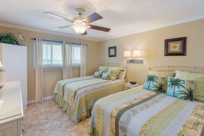 Two queen beds in 2nd bedroom provide plenty of sleeping for additional guests
