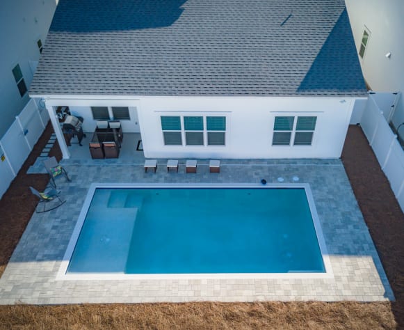 Large Private swimming pool with tanning shelf