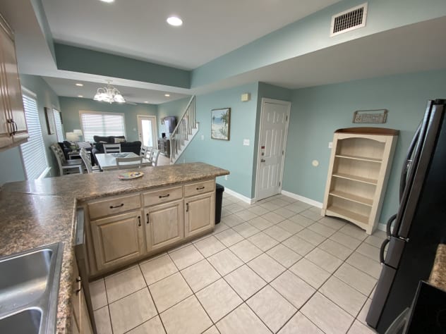 Kitchen with view of food storage shelves (1st floor ocean view)