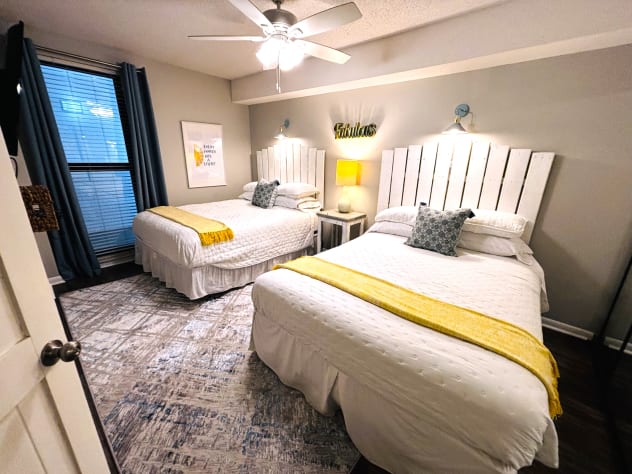Guest bedroom has TWO queens &amp; storage in the closet.