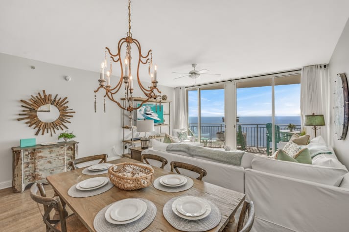 Gulf Front Dining! This beautifully remodeled and decorated home features stunning views of the Gulf of Mexico and Panama City Beach through floor to ceiling windows.
