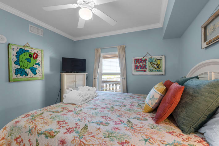 Third king size bedroom decorated with original paintings on antique windows 