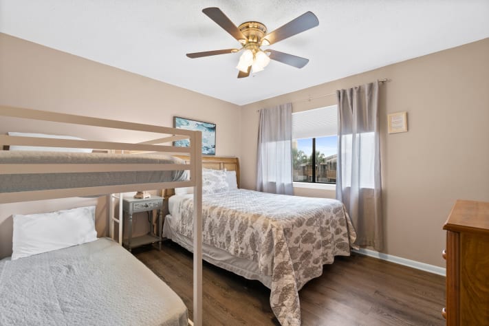 Guest Bedroom with twin bunks and queen bed