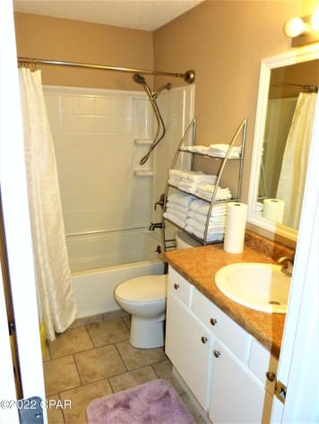 Full bathroom in upstairs hall.