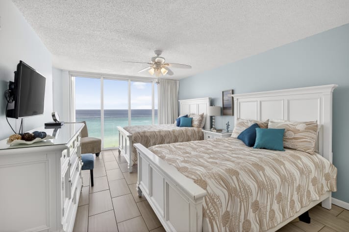 Bedroom with 2 Queen Beds, ensuite bath, floor to ceiling views.