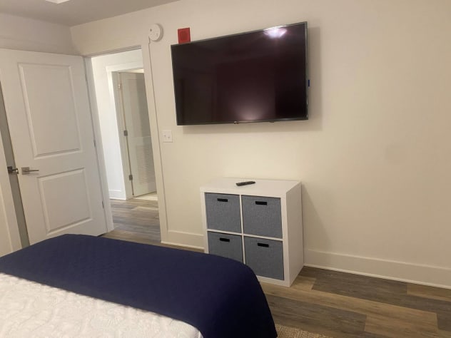 Queen bed with 55&rdquo; tv