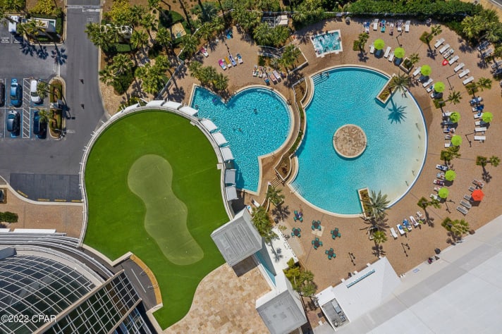 Aerial View of Putting Green, Pools, and Hot Tub