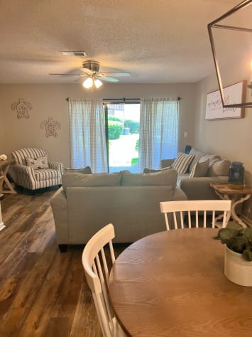 back patio has table and chairs for outdoor dining