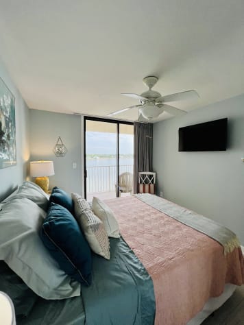 Guest bedroom with TV and Balcony 