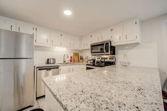 Fully - equipped kitchen , all new appliances 