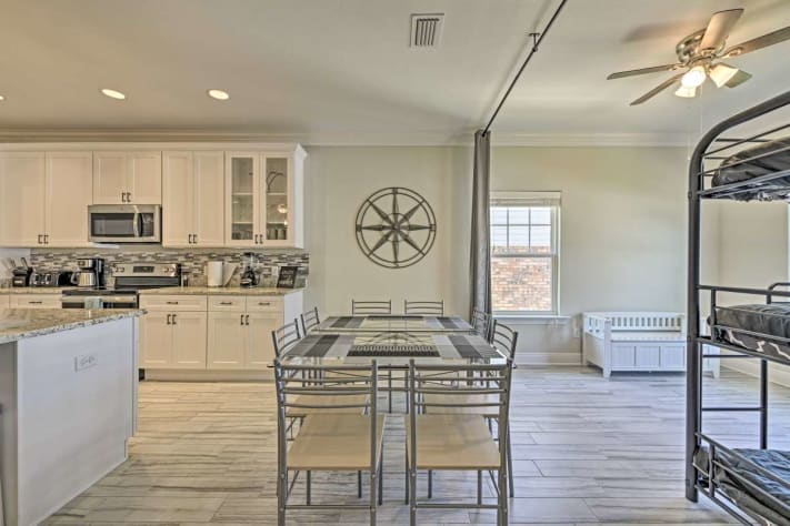 The kitchen has plenty of room for gathering and food prep or dining
