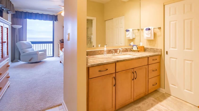 Master has an extra sink and mirror with plenty of storage.